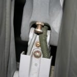 Armrest Hinge Close Up Embraer airplane safety, aircraft armrest hinge, aircraft armrest, infant safety