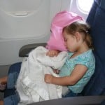 toddler on a plane, toddler sleeping on a plane, flying with a toddler