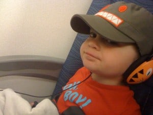 toddler on a plane, young child on a plane, preschooler on a plane, flying with toddlers