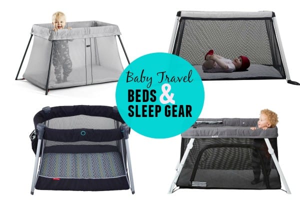 baby sleeping in travel cot