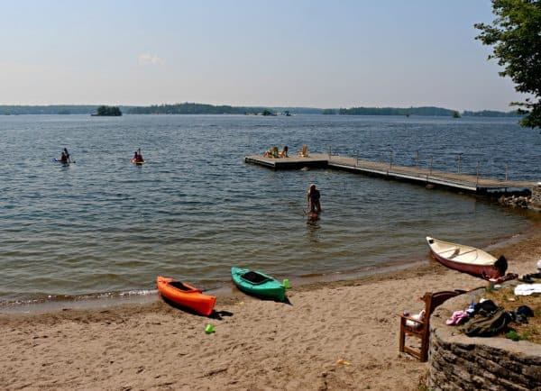 View of the beach and dock on Stoney Lake at Viamede Resort