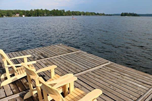 Muskoka chairs overlooking Stoney Lake at Viamede Resort